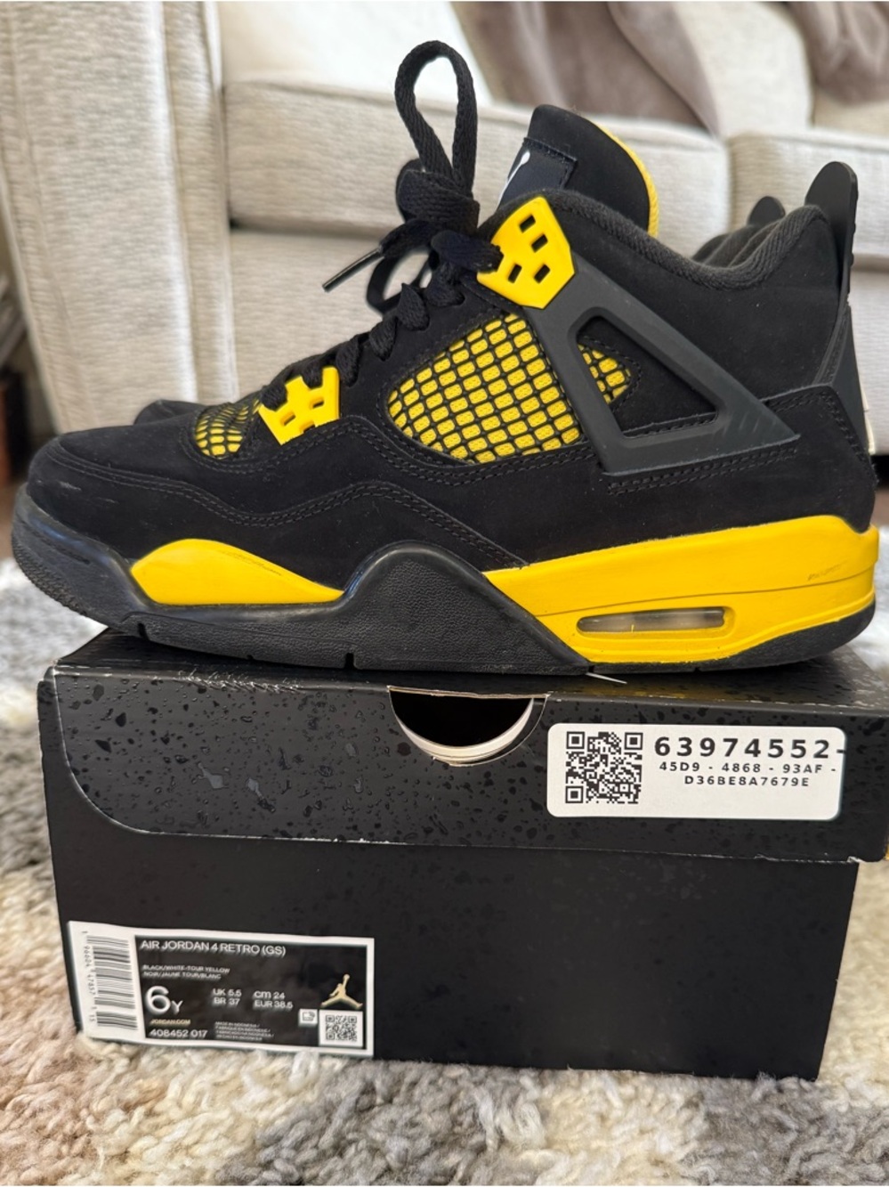Jordan Kids' Black and Yellow Retro 4 Sneakers